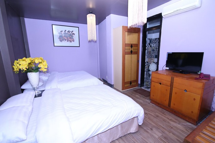 Imagen de la habitación del Hotel Geminai and Cafe. Foto 8