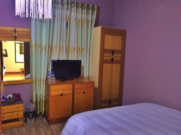 Imagen de la habitación del Hotel Geminai and Cafe. Foto 9