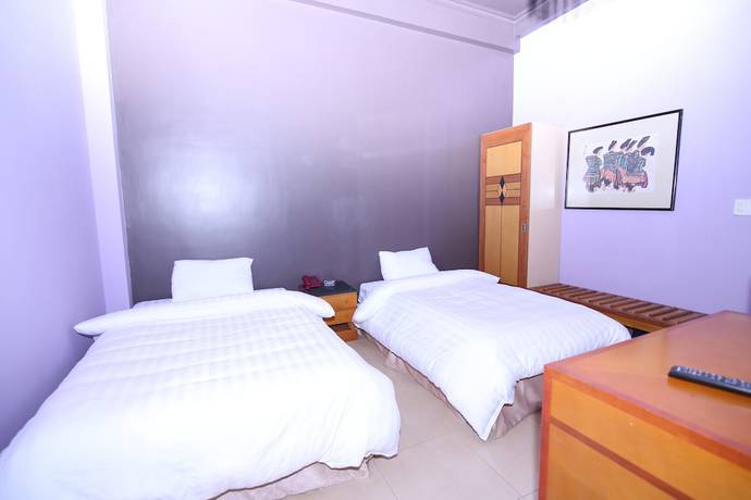 Imagen de la habitación del Hotel Geminai and Cafe. Foto 10