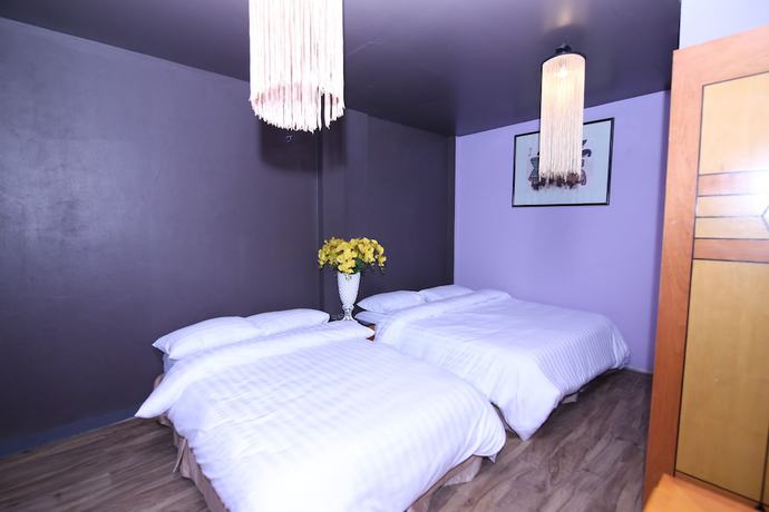 Imagen de la habitación del Hotel Geminai and Cafe. Foto 15