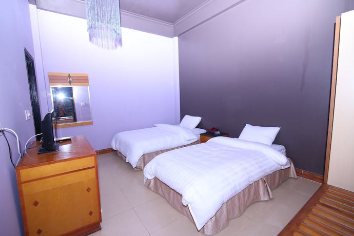 Imagen de la habitación del Hotel Geminai and Cafe. Foto 17