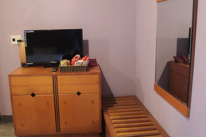 Imagen de la habitación del Hotel Geminai and Cafe. Foto 19