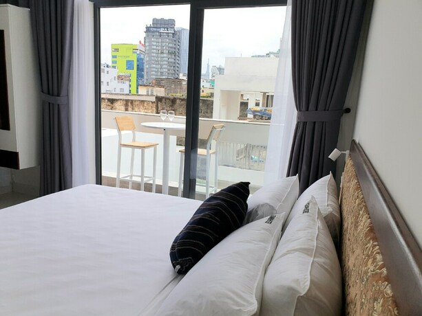 Imagen de la habitación del Hotel Gemini Saigon Hotel. Foto 3