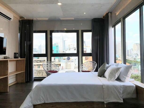 Imagen de la habitación del Hotel Gemini Saigon Hotel. Foto 7