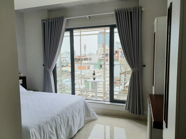 Imagen de la habitación del Hotel Gemini Saigon Hotel. Foto 15