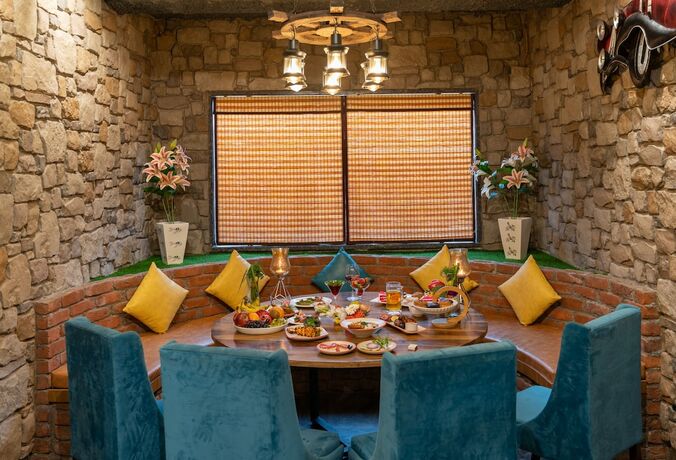 Imagen del bar/restaurante del Hotel Gems Inn. Foto 5