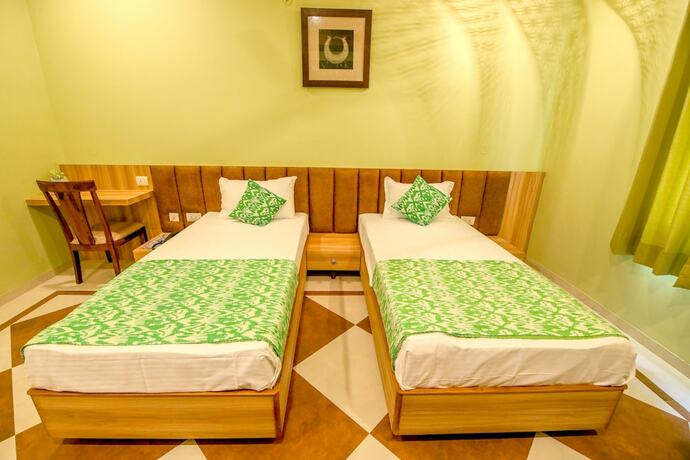 Imagen de la habitación del Hotel Gems Suites. Foto 20