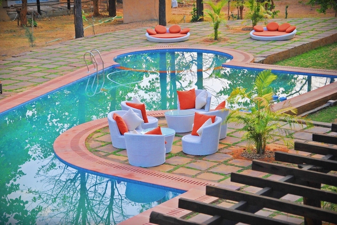 Imagen de la piscina del Hotel GenX Kanha By 1589. Foto 13