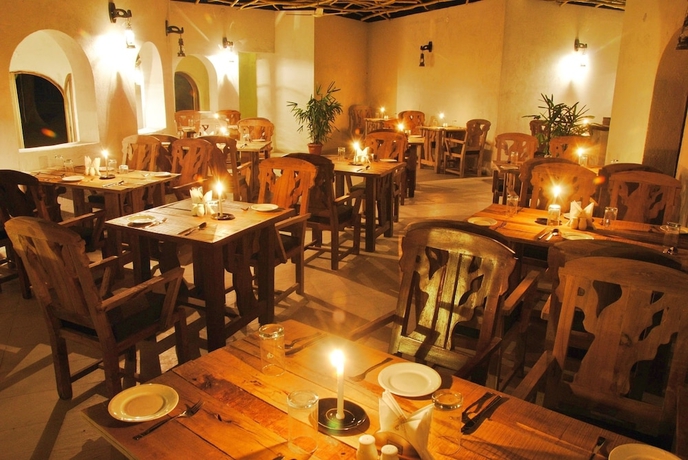 Imagen del bar/restaurante del Hotel GenX Kanha By 1589. Foto 5