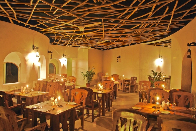 Imagen del bar/restaurante del Hotel GenX Kanha By 1589. Foto 6