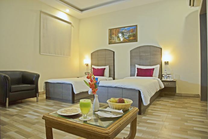 Imagen de la habitación del Hotel GenX Plaza Mughalsarai. Foto 5