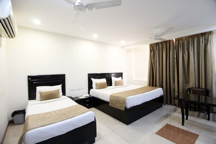 Imagen de la habitación del Hotel GenX Usha Kiran Agra. Foto 17