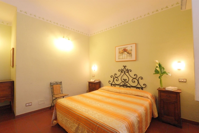 Imagen de la habitación del Hotel Genesio. Foto 13