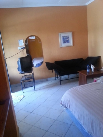 Imagen de la habitación del Hotel Genesis Guest House. Foto 6