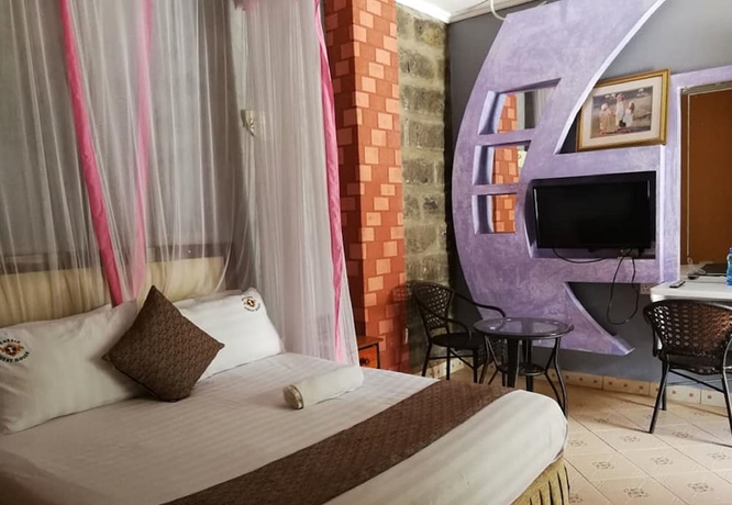 Imagen de la habitación del Hotel Genesis Guest House. Foto 8