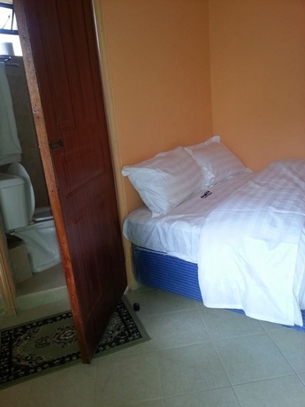 Imagen de la habitación del Hotel Genesis Guest House. Foto 9