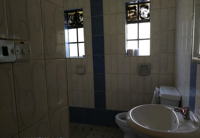 Imagen de la habitación del Hotel Genesis Guest House. Foto 14