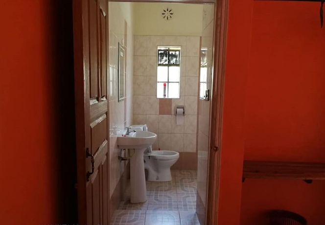 Imagen de la habitación del Hotel Genesis Guest House. Foto 15