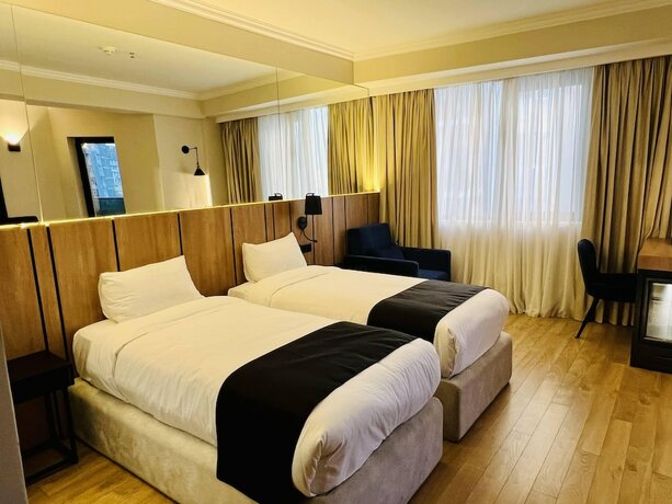 Imagen de la habitación del Hotel Genesis, Tbilisi. Foto 12