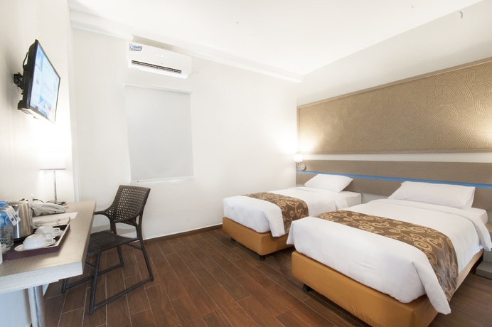 Imagen de la habitación del Hotel Genio Manado. Foto 11