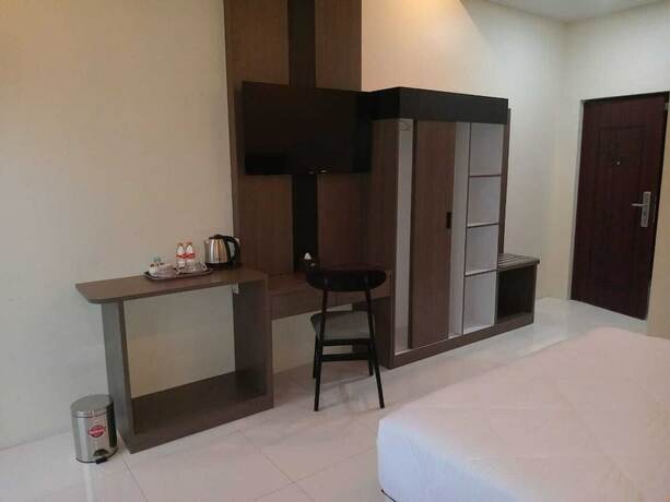 Imagen de la habitación del Hotel Genio Syariah Solo. Foto 7