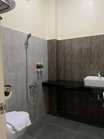 Imagen de la habitación del Hotel Genio Syariah Solo. Foto 9