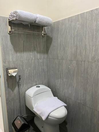 Imagen de la habitación del Hotel Genio Syariah Solo. Foto 11