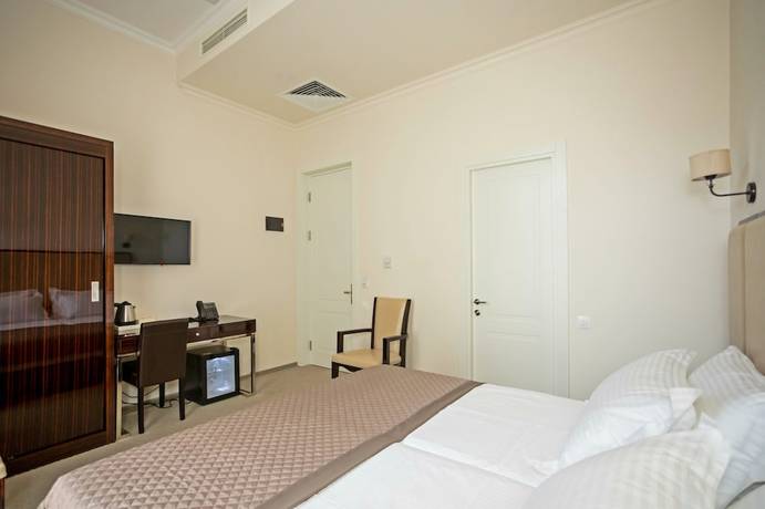 Imagen de la habitación del Hotel Genio, Tbilisi. Foto 12