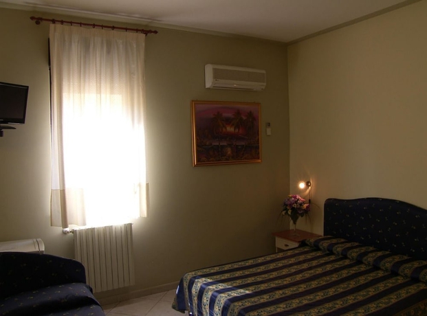 Imagen de la habitación del Hotel Genius, Corato. Foto 13