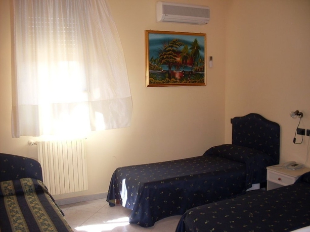 Imagen de la habitación del Hotel Genius, Corato. Foto 15