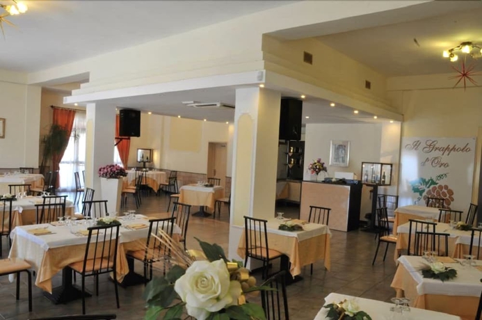 Imagen del bar/restaurante del Hotel Genius, Corato. Foto 2