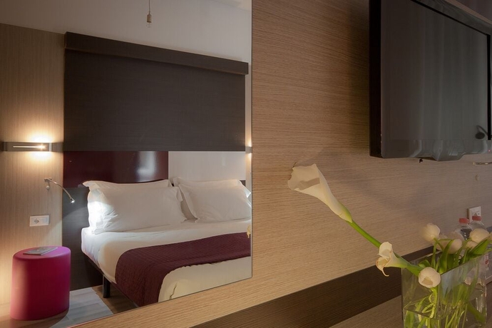 Imagen de la habitación del Hotel Genius Downtown. Foto 12