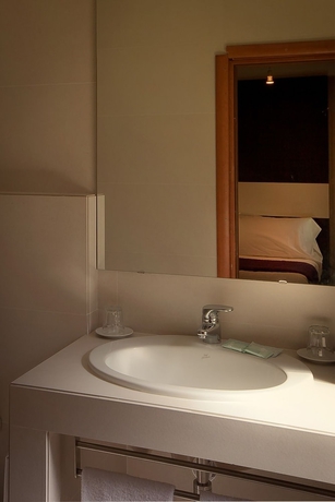 Imagen de la habitación del Hotel Genius Downtown. Foto 14