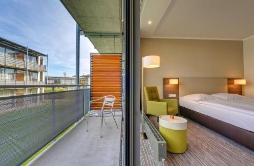 Imagen de la habitación del Hotel Genohotel Baunatal. Foto 8