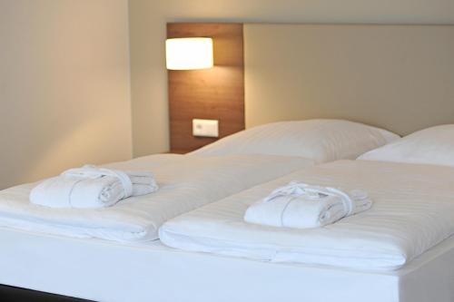 Imagen de la habitación del Hotel Genohotel Baunatal. Foto 10