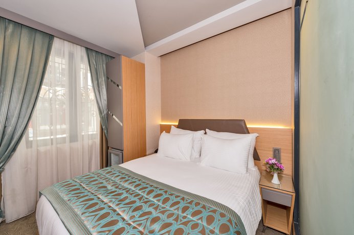 Imagen de la habitación del Hotel Genova, Fatih. Foto 4