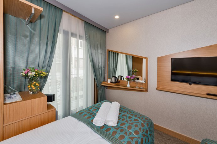 Imagen de la habitación del Hotel Genova, Fatih. Foto 6