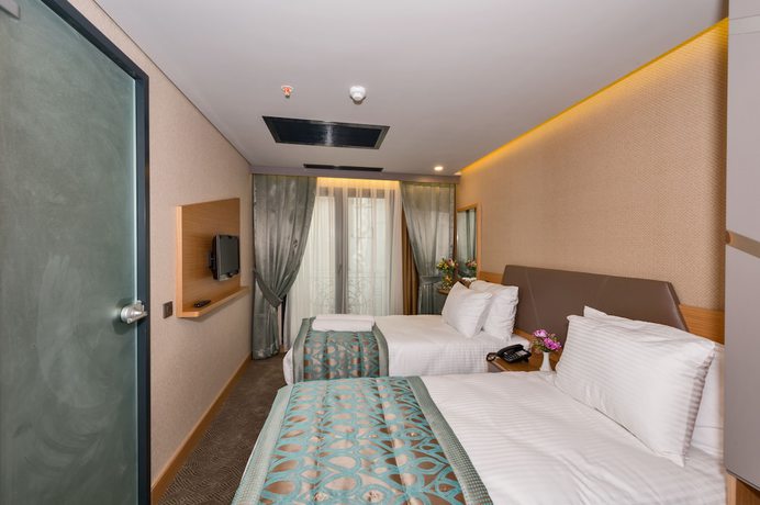 Imagen de la habitación del Hotel Genova, Fatih. Foto 7