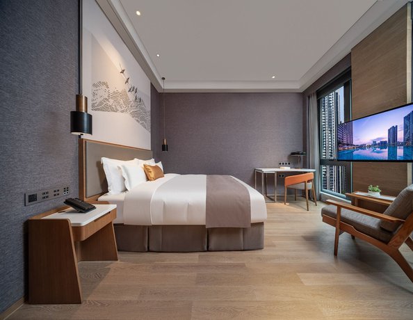 Imagen de la habitación del Hotel Genpla Shenzhen Nanshan. Foto 4