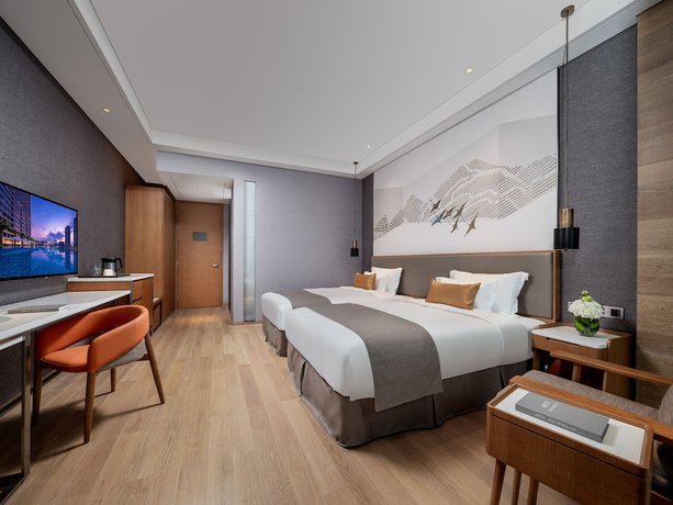 Imagen de la habitación del Hotel Genpla Shenzhen Nanshan. Foto 5