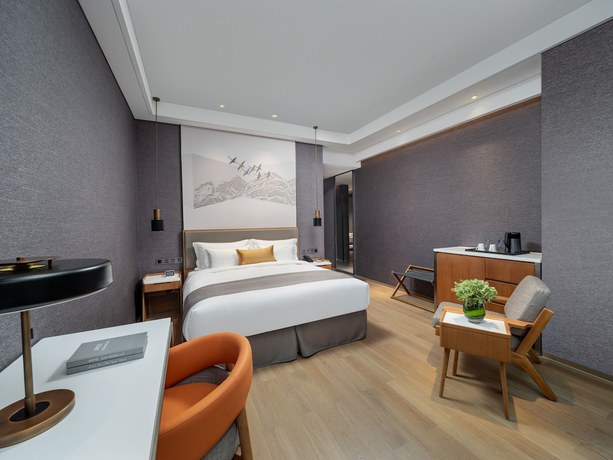 Imagen de la habitación del Hotel Genpla Shenzhen Nanshan. Foto 10