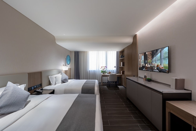 Imagen de la habitación del Hotel Genpla Shenzhen Qianhai. Foto 4