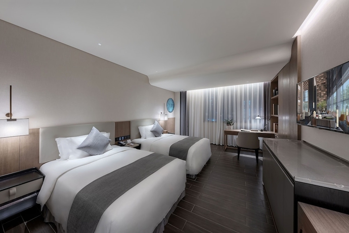 Imagen de la habitación del Hotel Genpla Shenzhen Qianhai. Foto 5