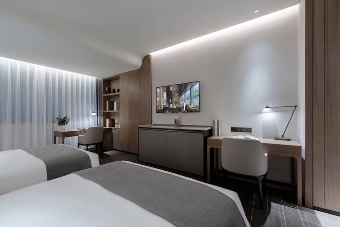 Imagen de la habitación del Hotel Genpla Shenzhen Qianhai. Foto 6