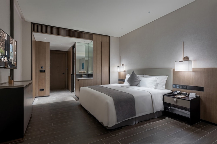 Imagen de la habitación del Hotel Genpla Shenzhen Qianhai. Foto 10