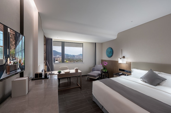 Imagen de la habitación del Hotel Genpla Shenzhen Qianhai. Foto 11