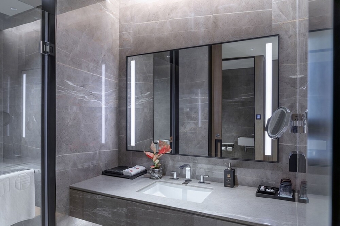 Imagen de la habitación del Hotel Genpla Shenzhen Qianhai. Foto 12