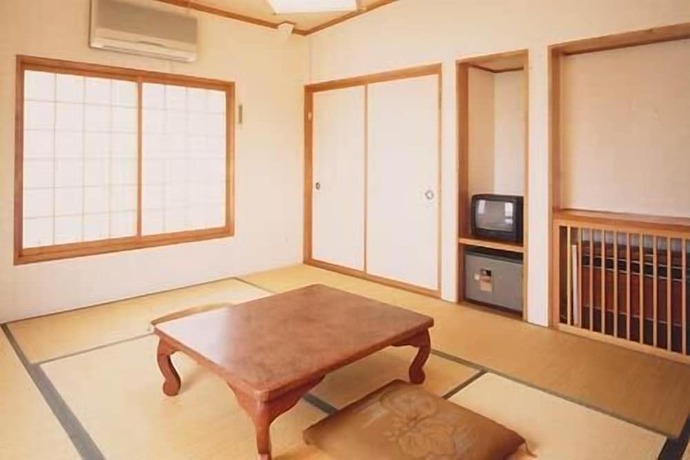 Imagen de la habitación del Hotel Gensen no Yado Maruishi Ryokan. Foto 18