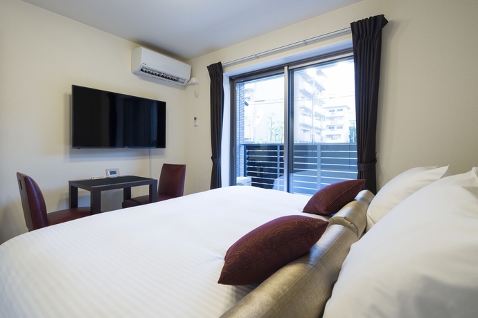 Imagen de la habitación del Hotel Gentle Fox Kyoto. Foto 15