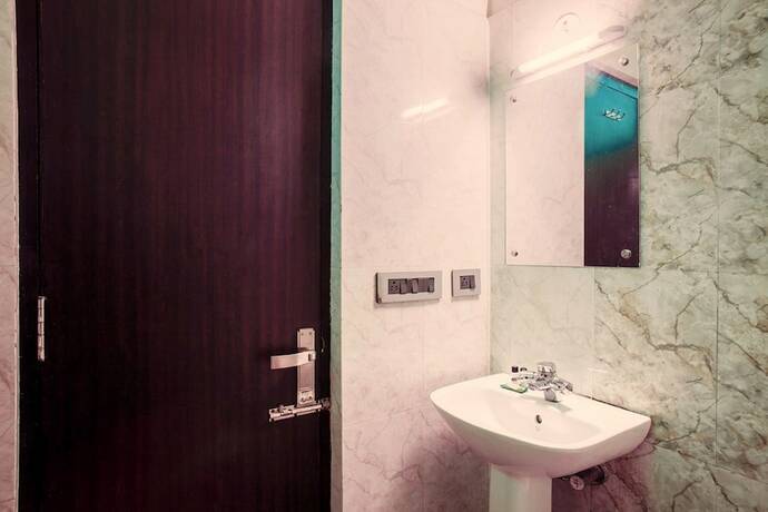 Imagen de la habitación del Hotel Genx Sundaram, Haldwani. Foto 3